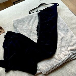 Black one-sleeved gown with beaded detail